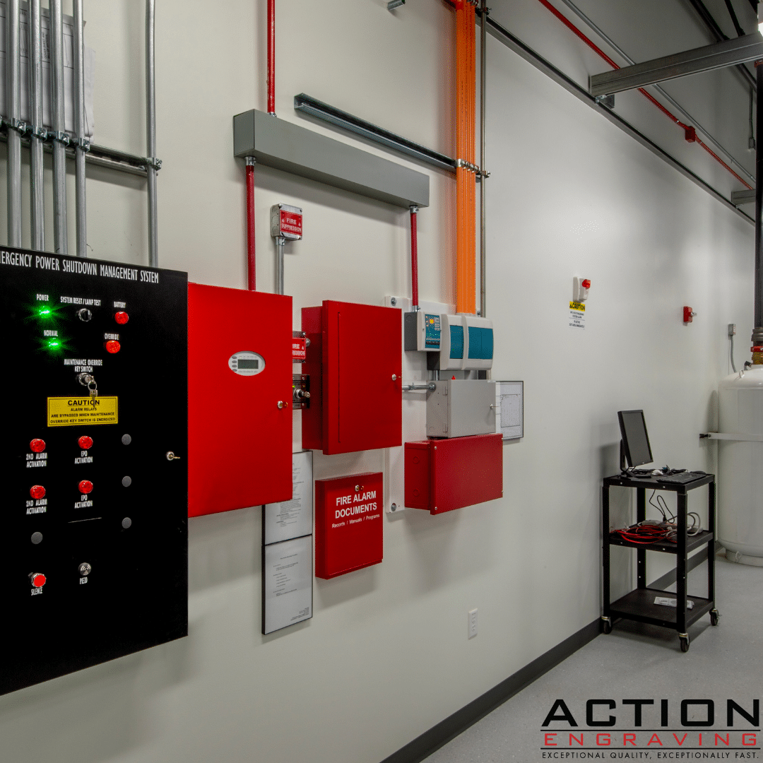hallway with labeled electrical equipment